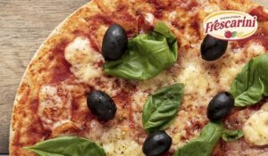 Pizza con la deliciosa de salsa Frescarini™